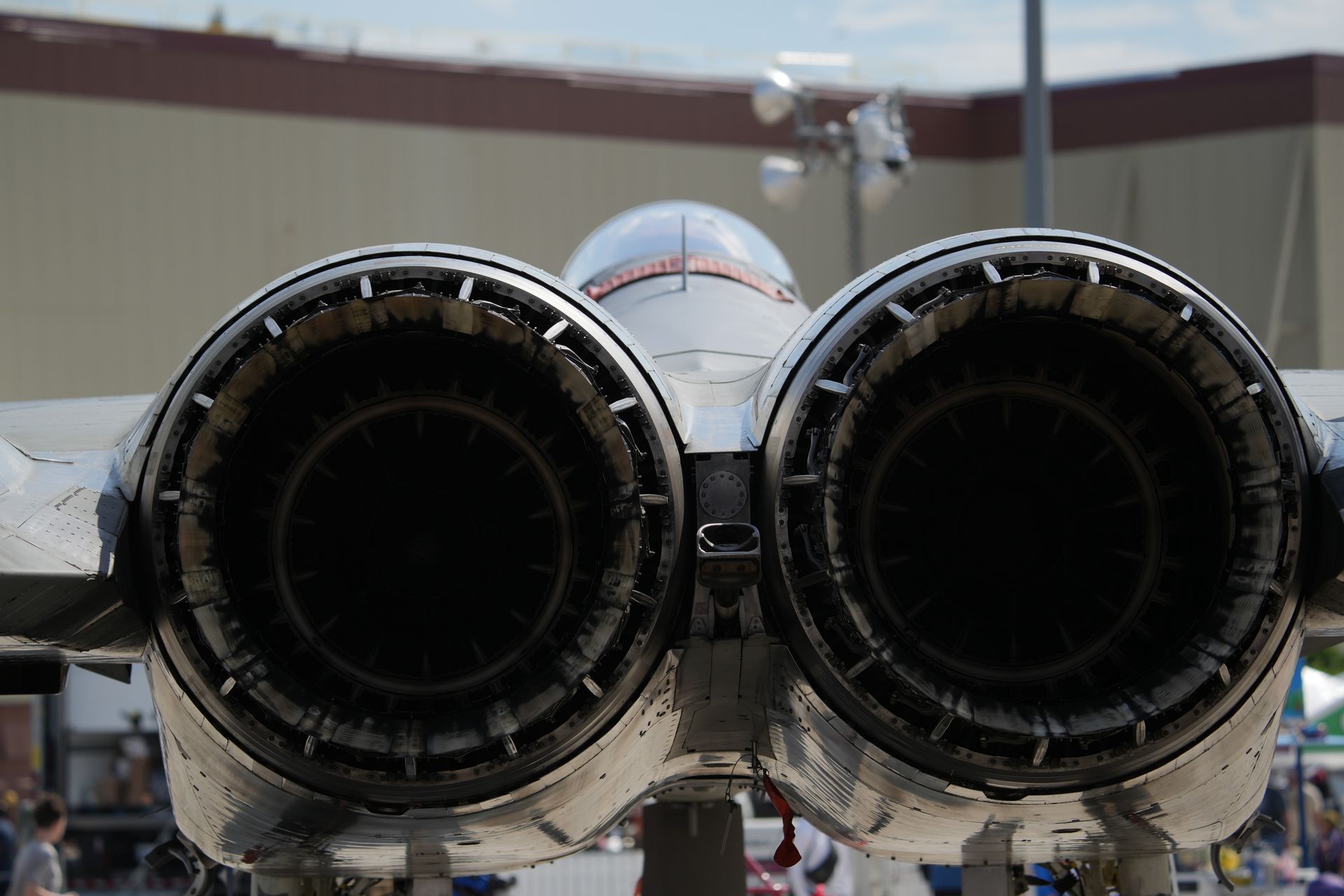 Close-up of twin fighter jet engine nozzles